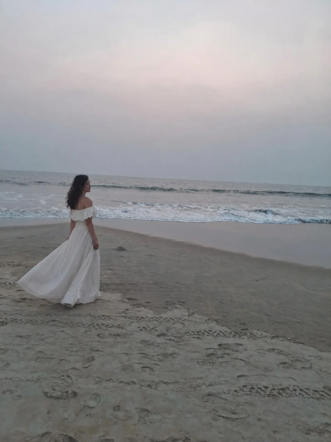 Gloria on the beach at dusk